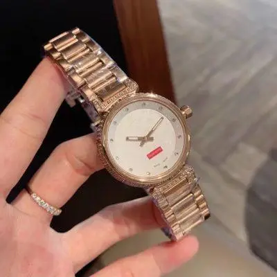 LOUIS VUITTON LV 904l Stainless Steel Quartz Watch 33MM — LOUIS VUITTON